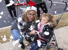 little girl enjoying snow 